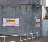 A group of warnings at O'Shaughnessy Dam, a hydroelectric plant