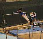 Gymnast on uneven bars